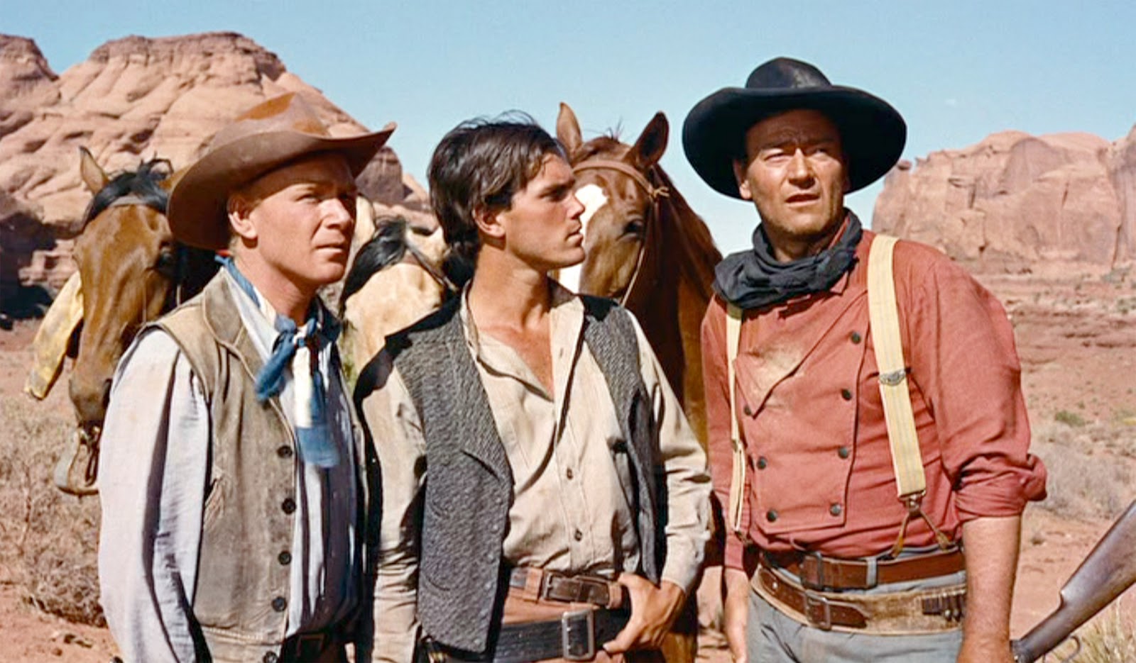Harry Carey, Jr., Jeffrey Hunter et John Wayne dans "La Prisonnière du désert"
