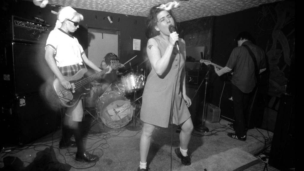 Bikini Kill performs in Washington, D.C., in the 1990s.